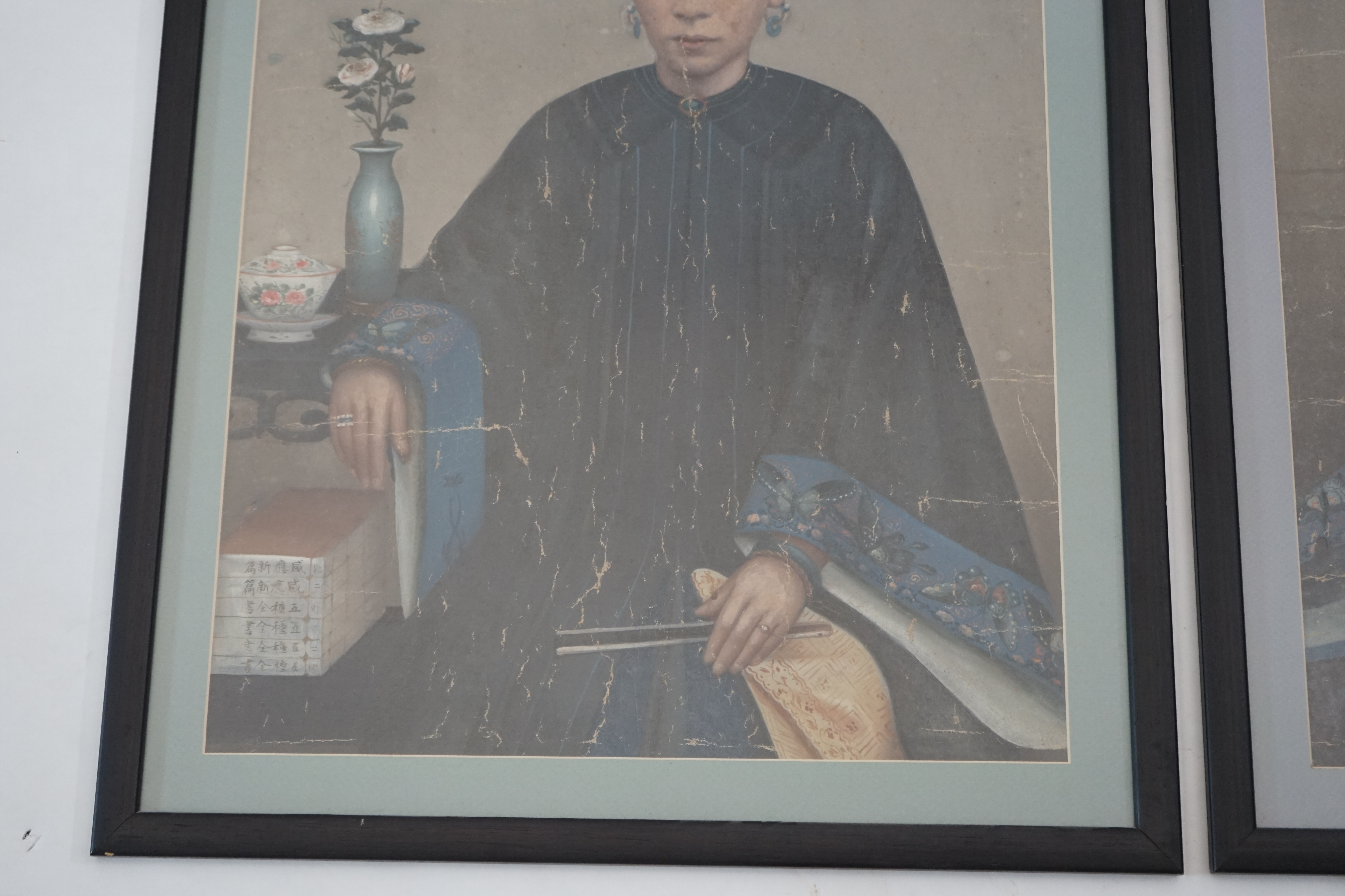 China Trade, late Qing dynasty, two portraits of Qing ladies, oil on canvas, each 63 x 47cm, later framed and glazed. Condition - poor to fair